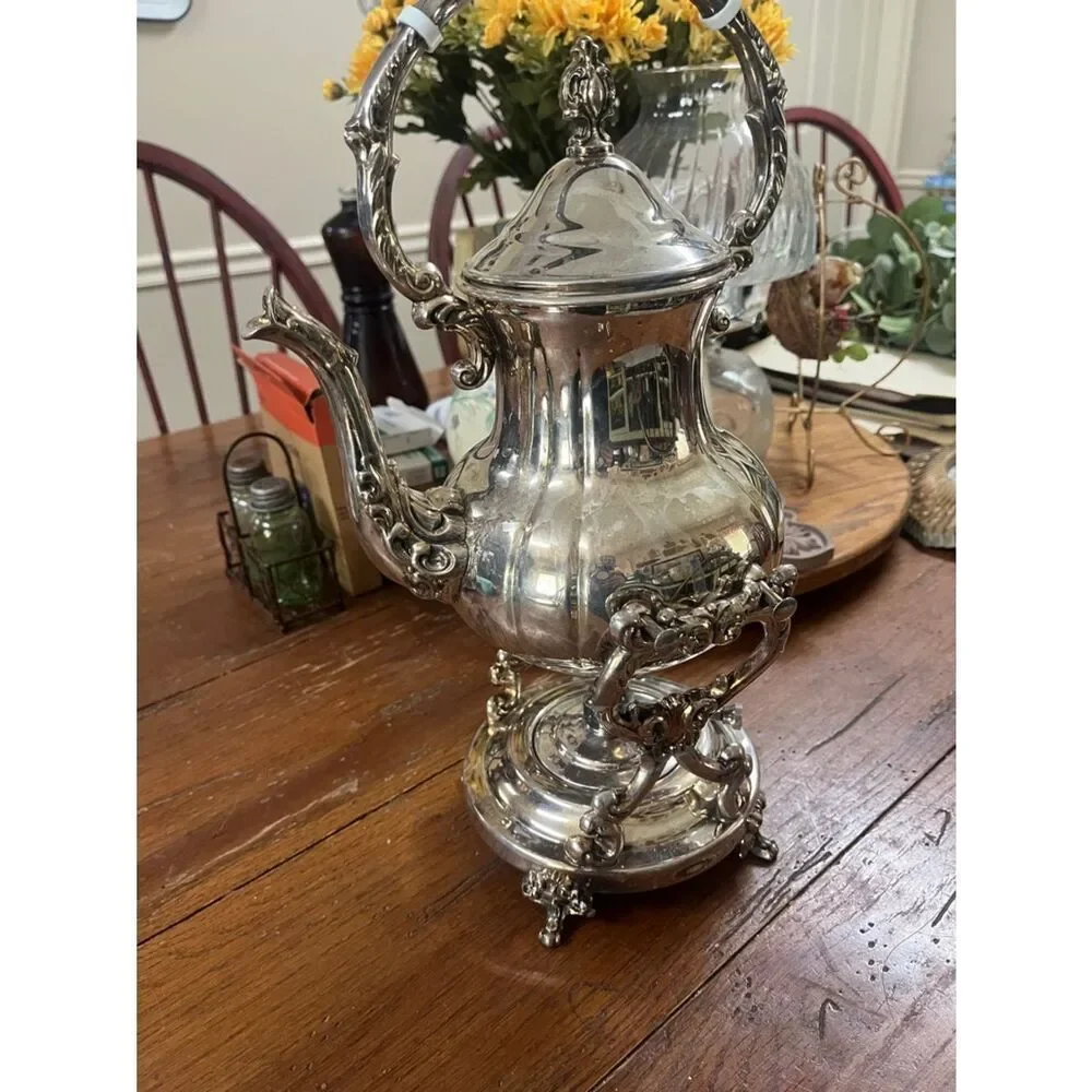 Towle tilting teapot